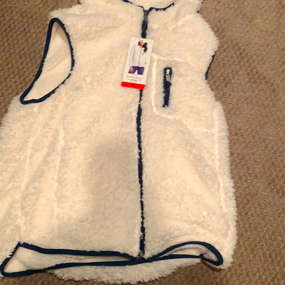 White medium vest with hood.